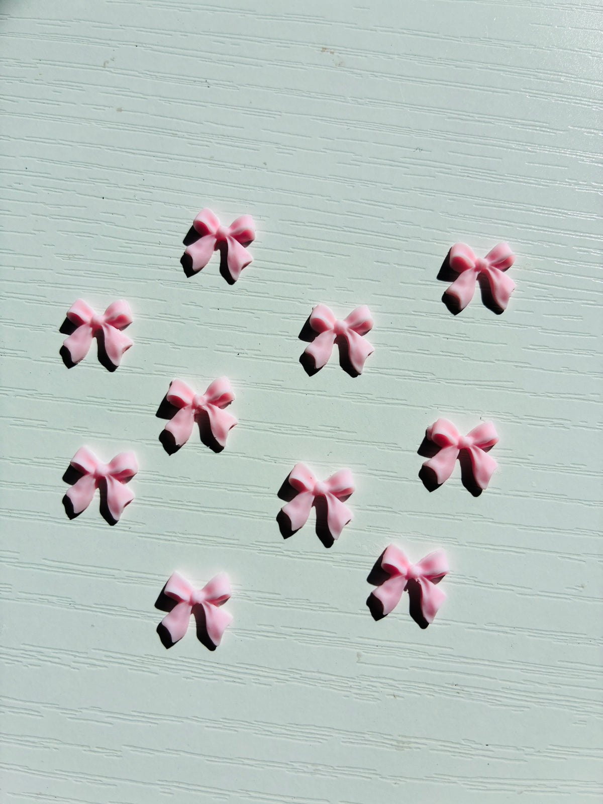 Bijoux d’ongles 3D – Nœuds roses – Lot de 10