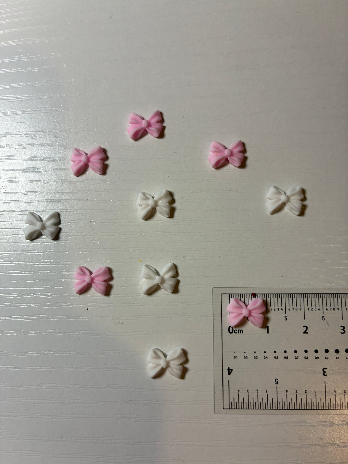 Bijoux d’ongles 3D – Nœuds papillon roses et blancs – Lot de 10