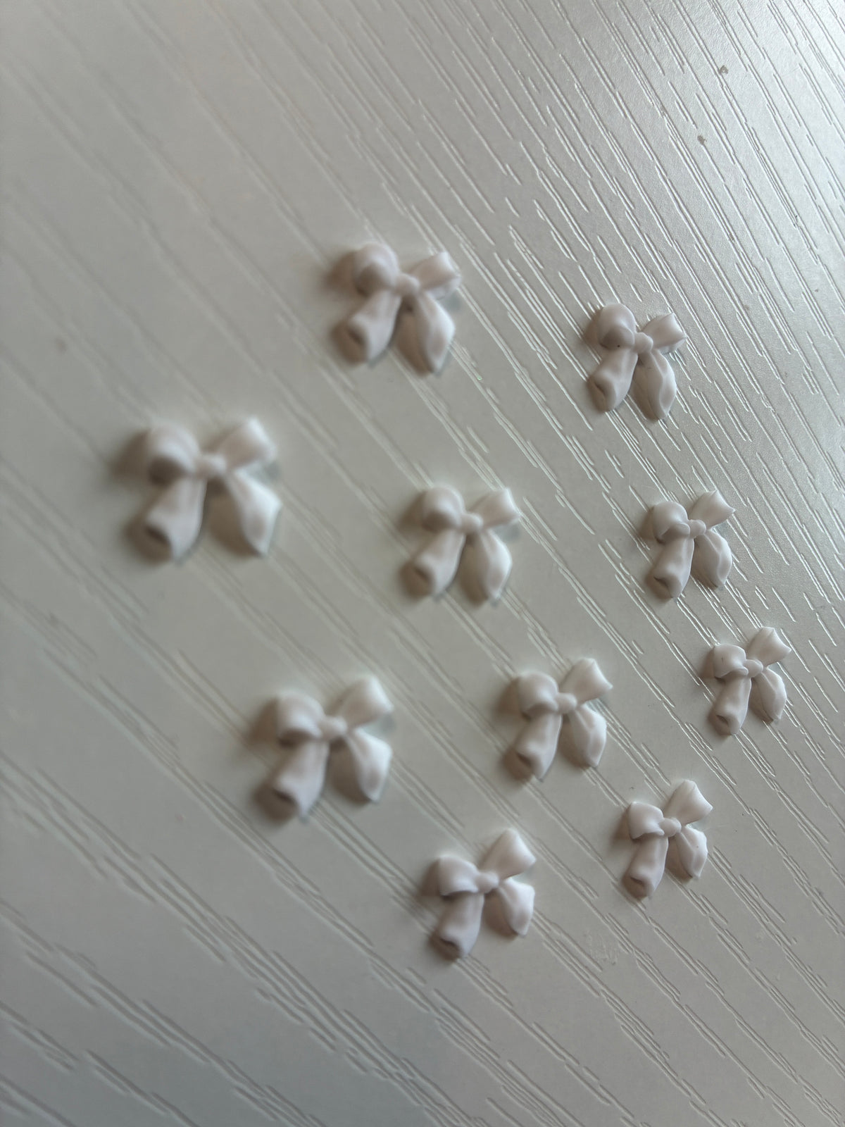 Bijoux d’ongles 3D – Nœuds blancs – Lot de 10