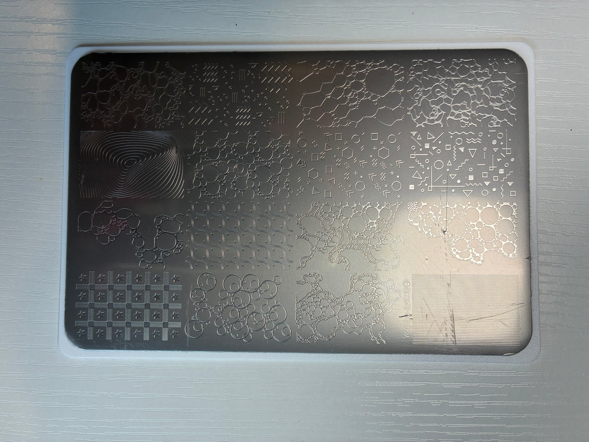 Plaque de stamping – Bulles & motifs graphiques