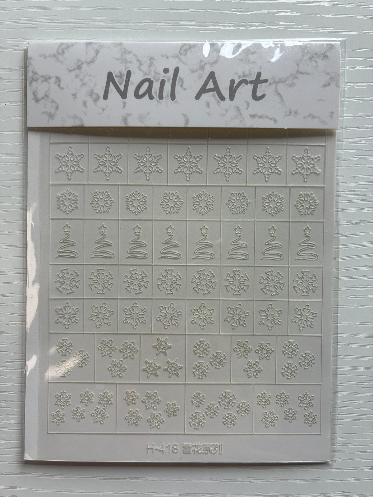 Pochoirs pour ongles – Flocons et sapins de Noël