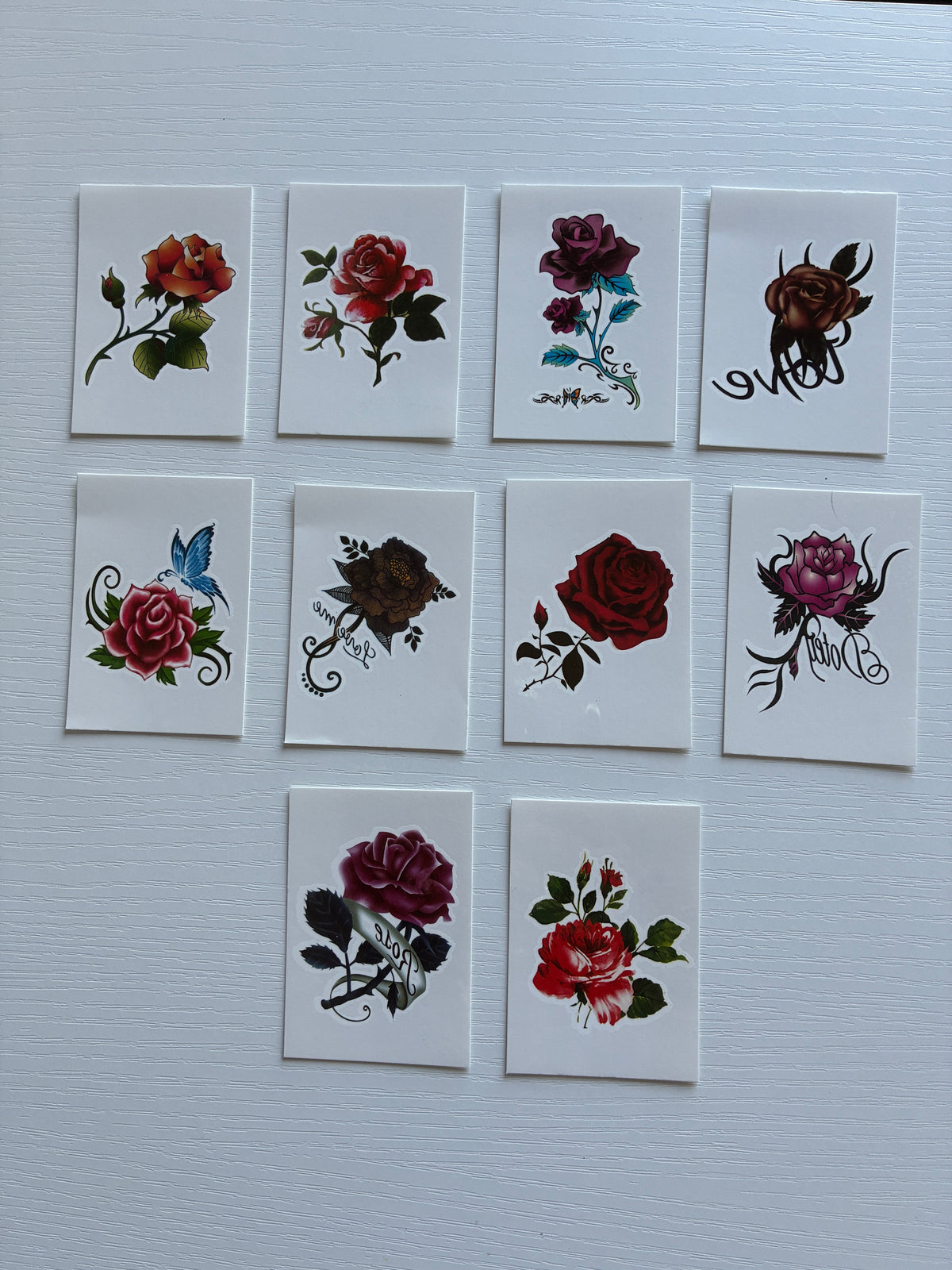 Lot de 10 tatouages éphémères Roses & Fleurs – Rouge, Bordeaux & Violet
