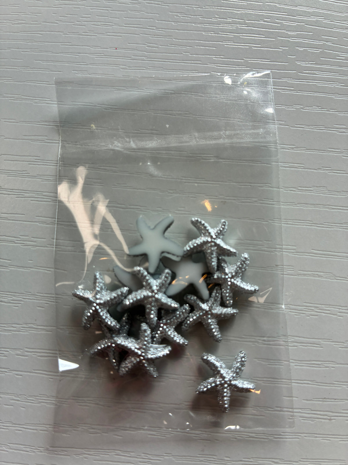 Étoiles de mer Nail Art argentées – Lot de 12