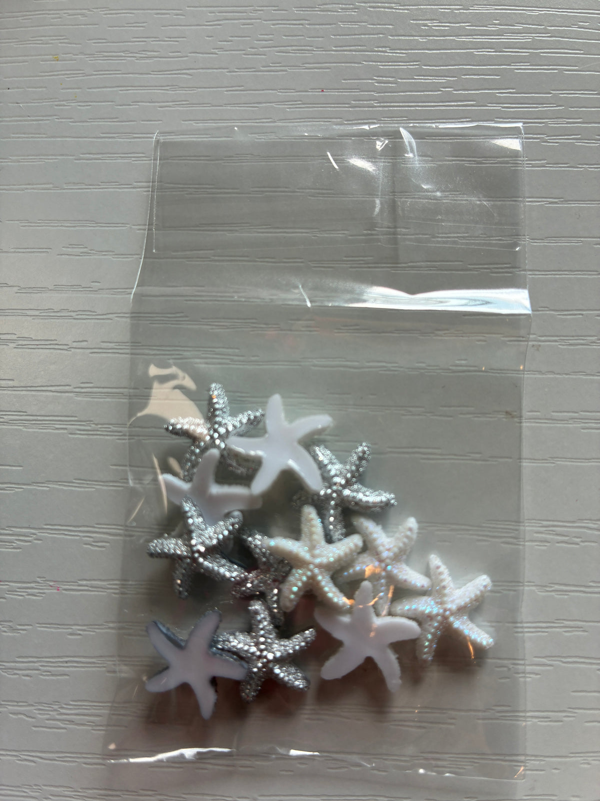 Étoiles de mer Nail Art blanches et argentées – Lot de 12