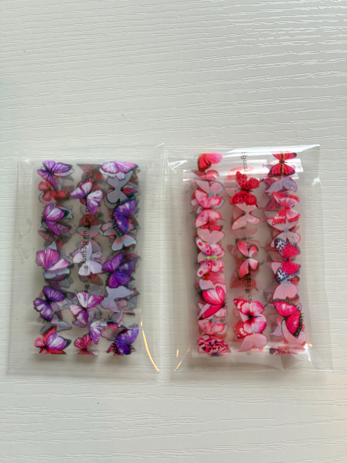 Foils Nail Art – Papillons roses et mauves – Lot de 2