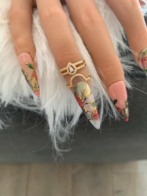 Bague bout de doigt goutte à strass dorée