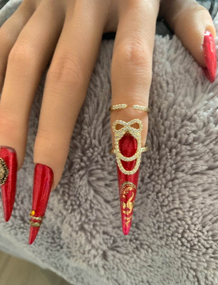 Bague d'ongle Nœud précieux dorée