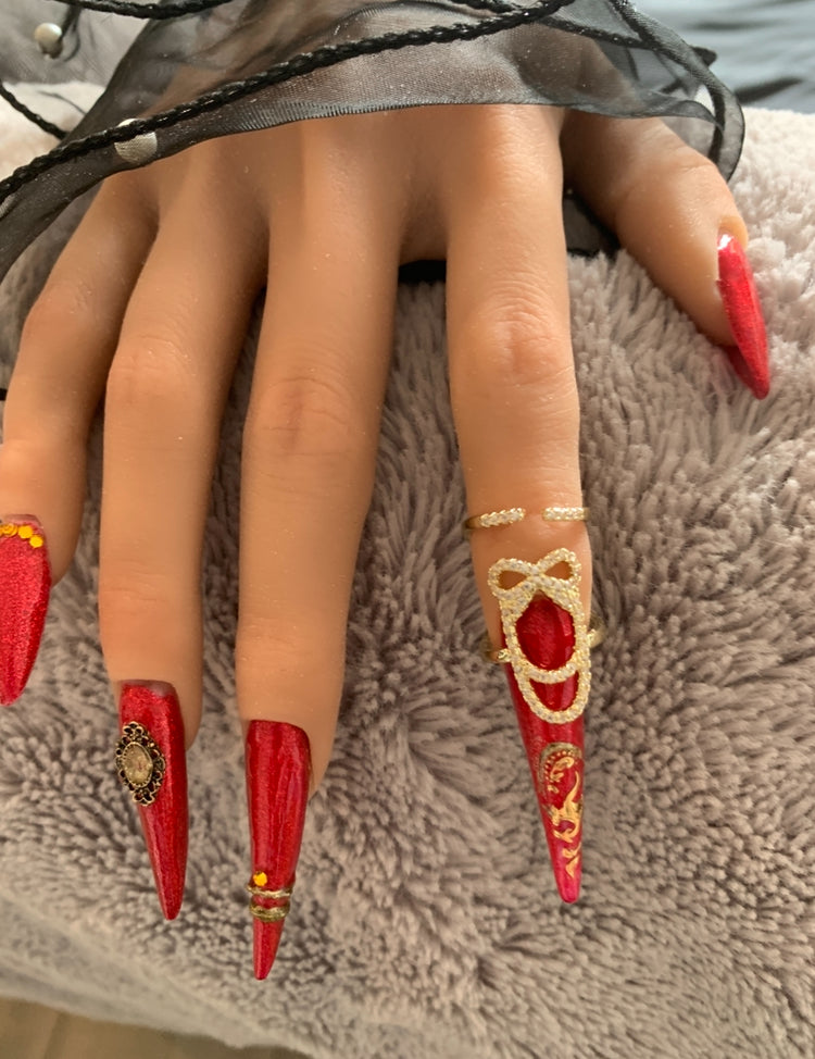 Bague d'ongle Nœud précieux dorée