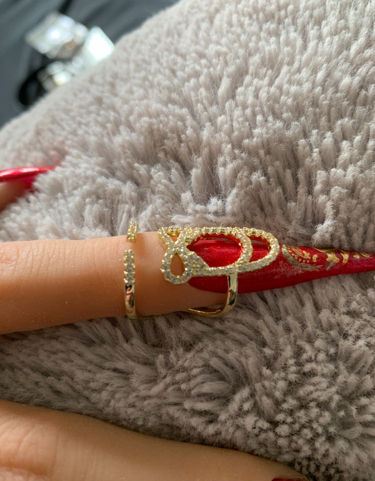 Bague d'ongle Nœud précieux dorée
