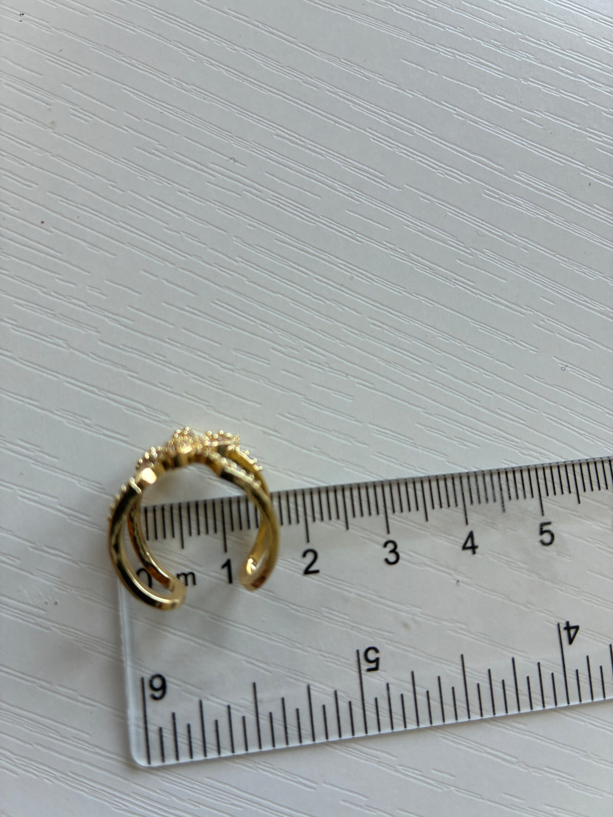 Bague d’ongle Fleur dorée à strass – Ajustable