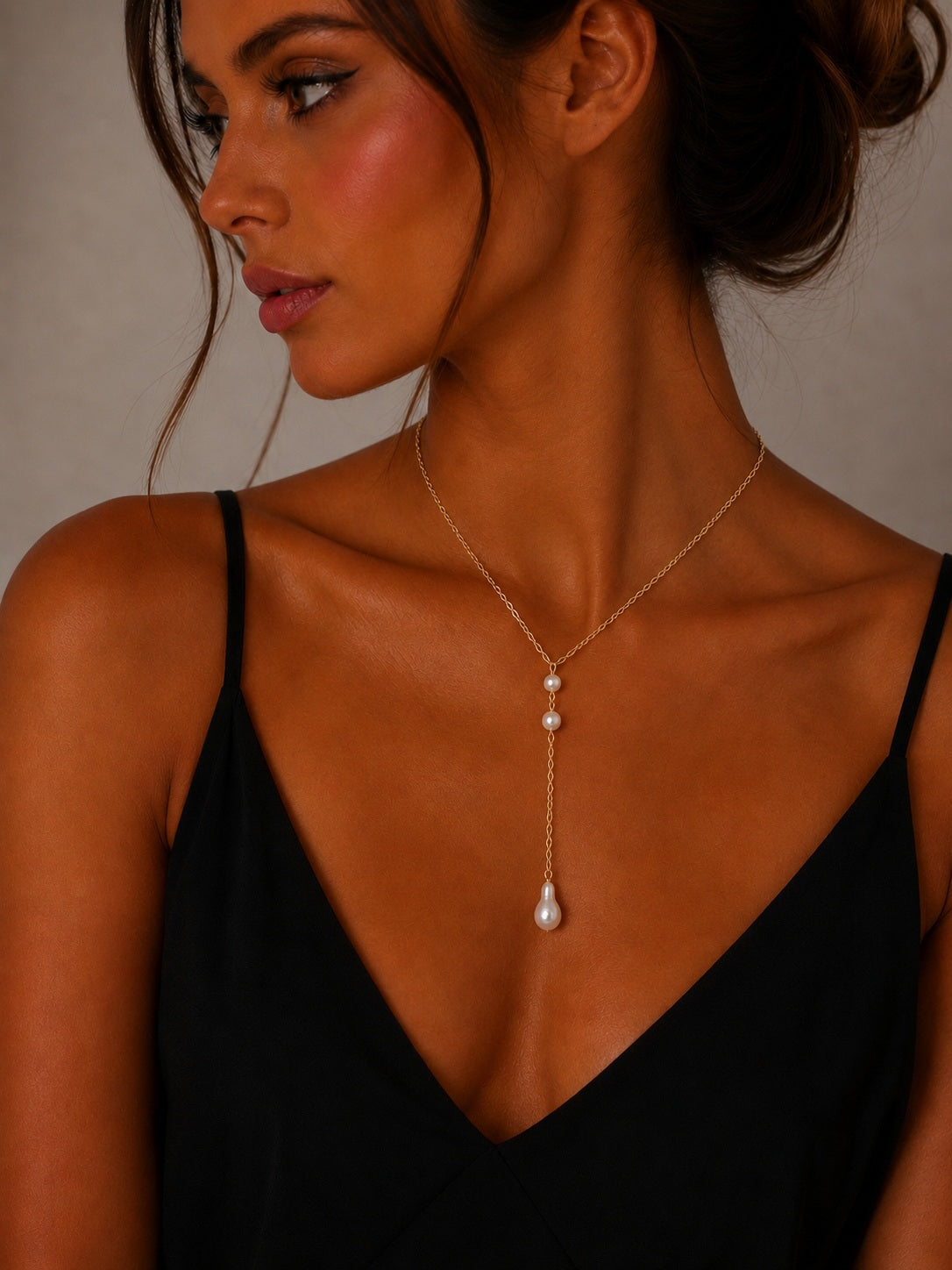 Collier de dos doré perles