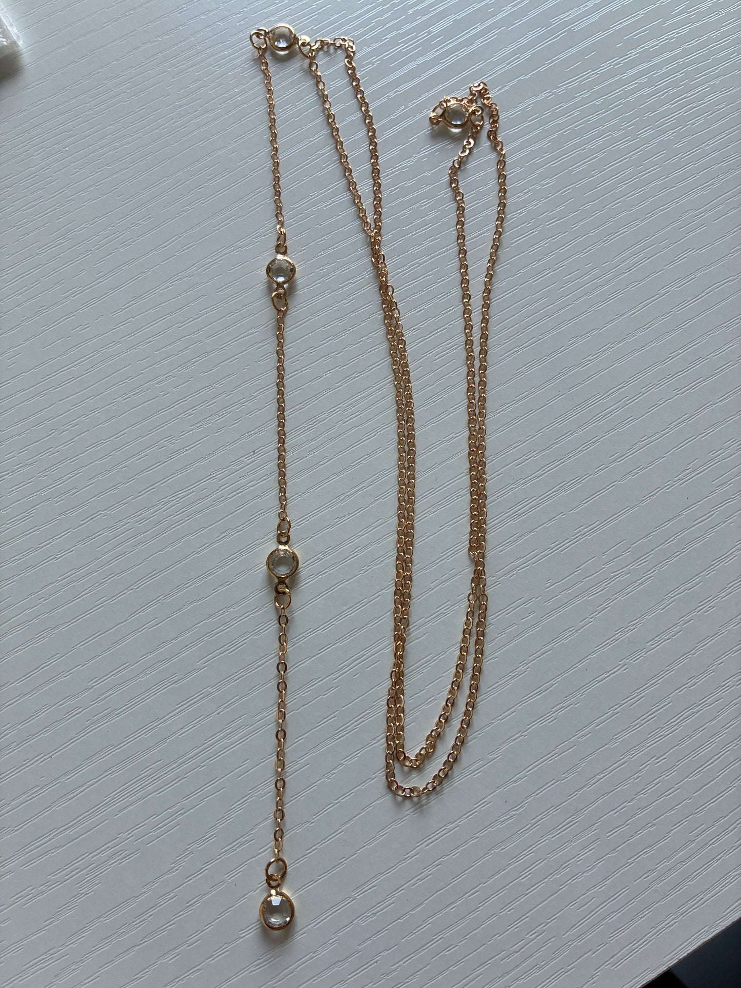 Collier de dos doré 4 strass