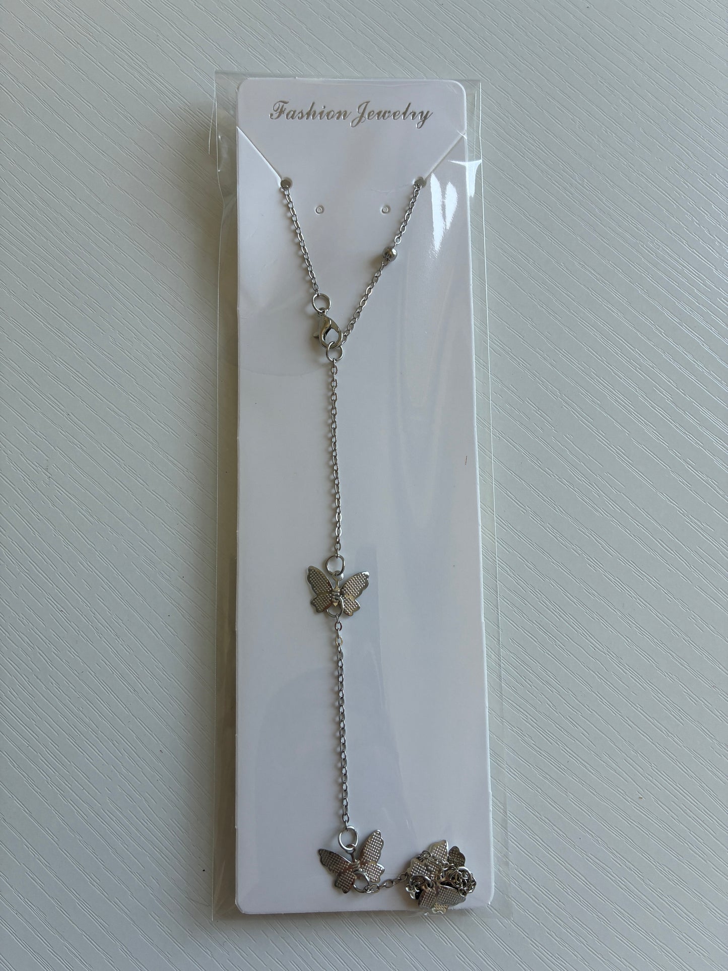 Chaîne de dos argentée Papillons – Bijou de dos bohème chic