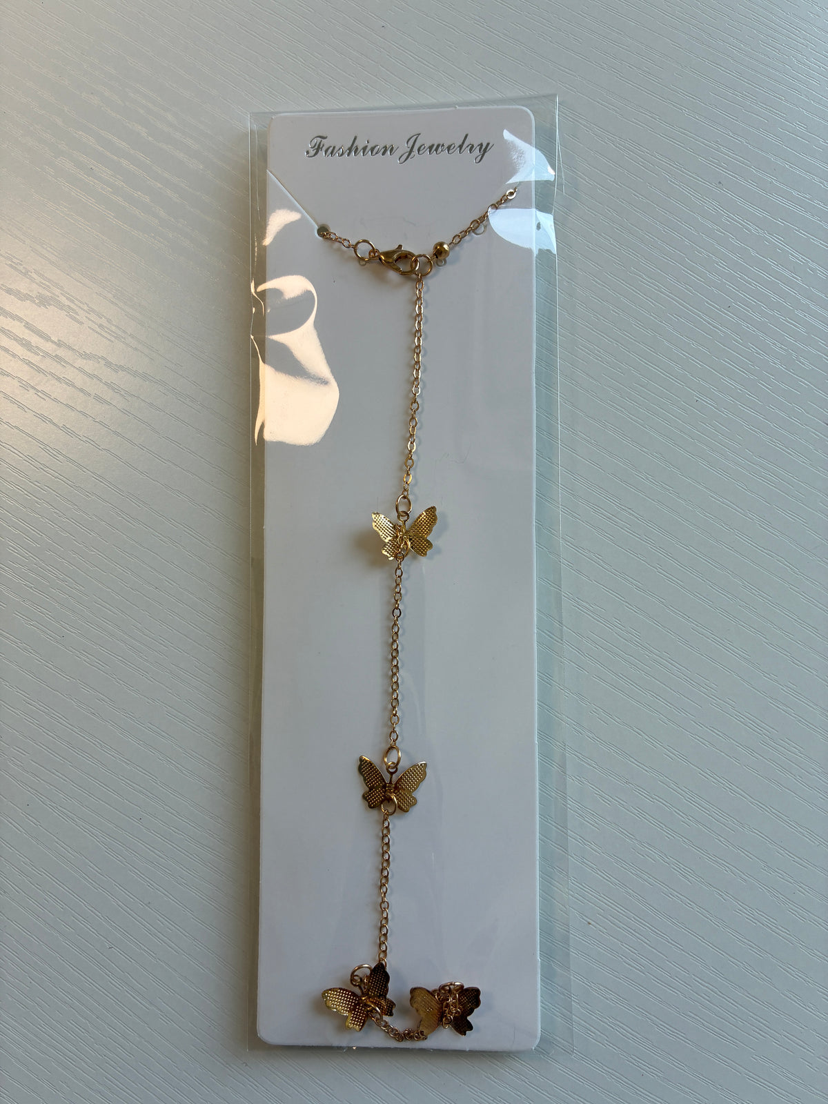 Chaîne de dos dorée Papillons – Bijou de dos bohème chic