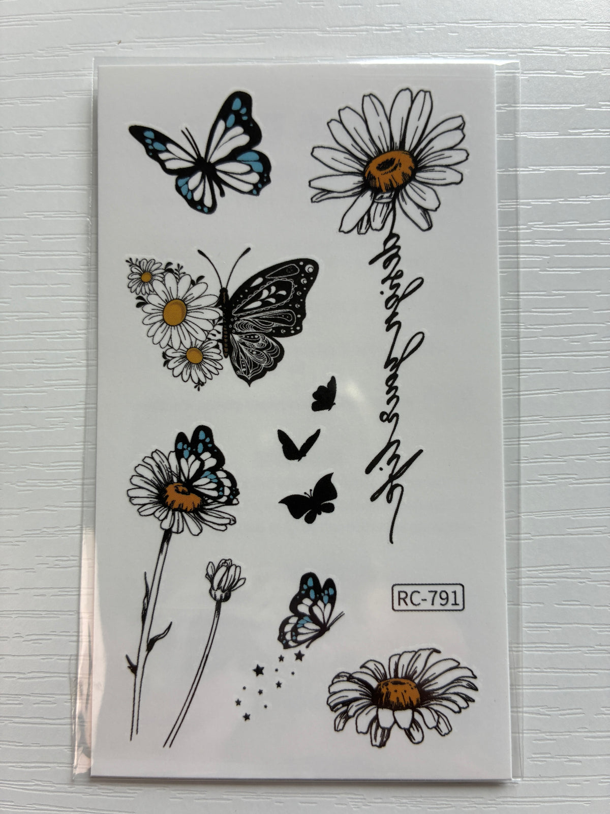 Planche de tatouages éphémères Marguerites & Papillons – 8 motifs