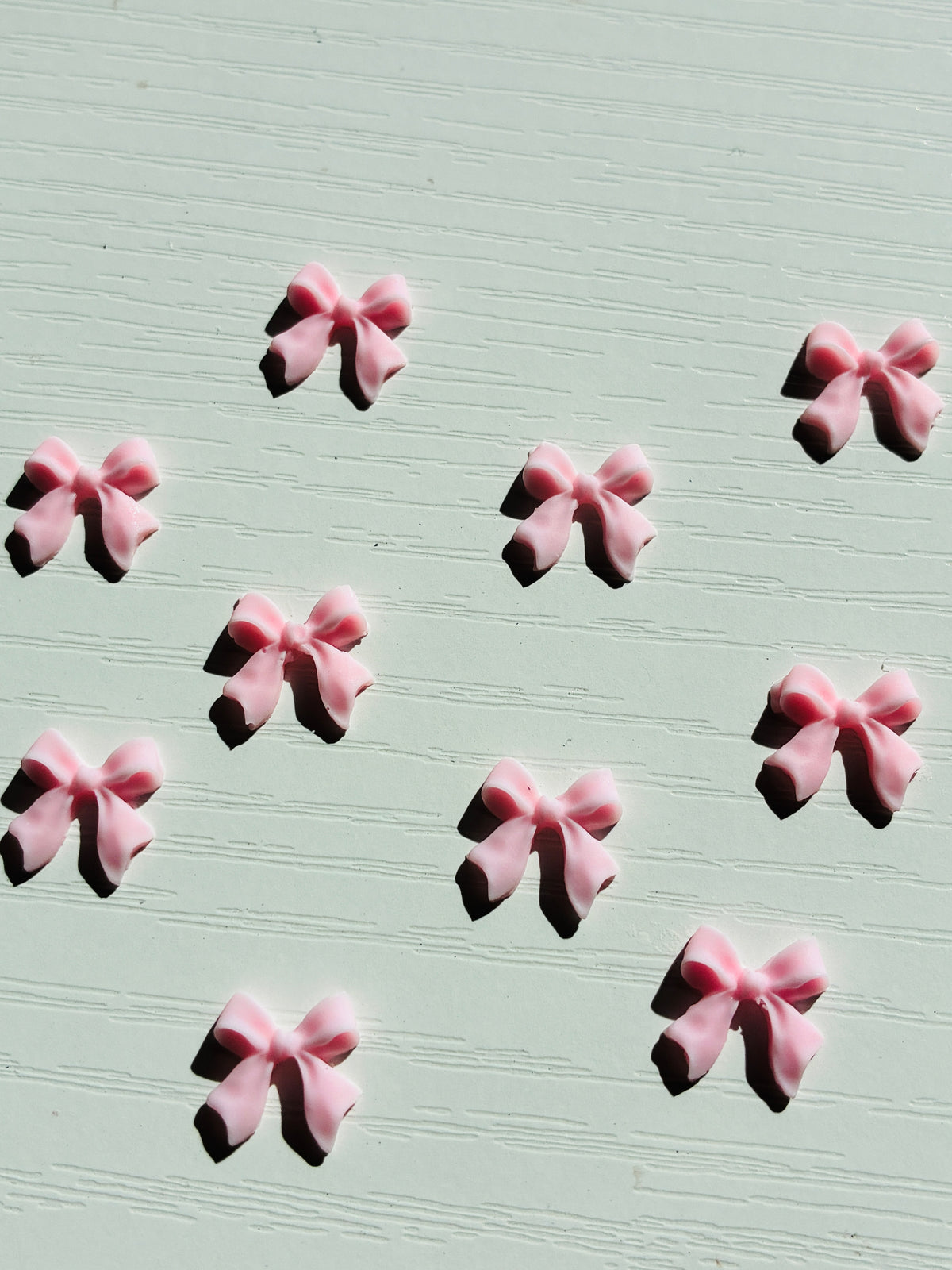 Bijoux d’ongles 3D – Nœuds roses – Lot de 10