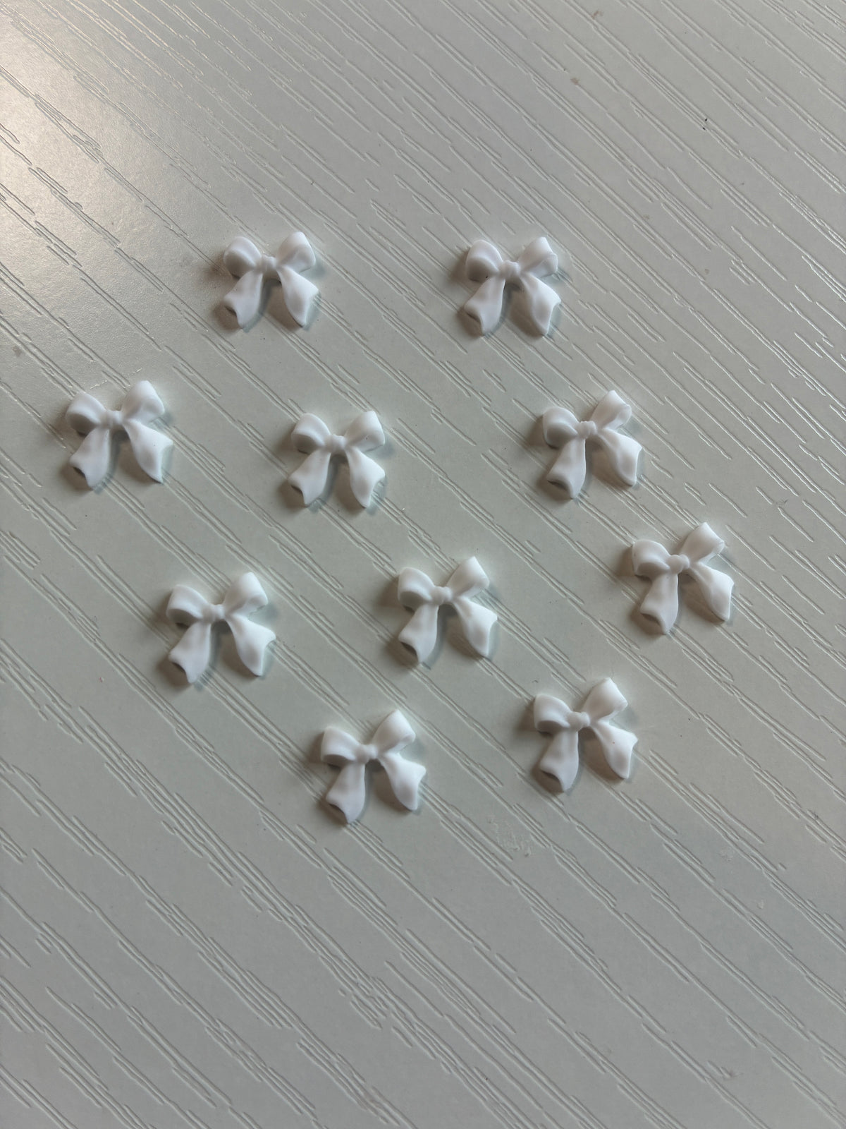 Bijoux d’ongles 3D – Nœuds blancs – Lot de 10