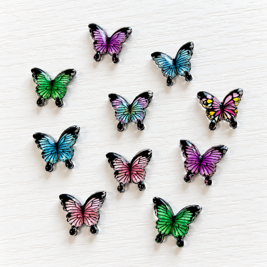 Papillons Nail Art multicolores – Lot de 10 – Assortiment aléatoire