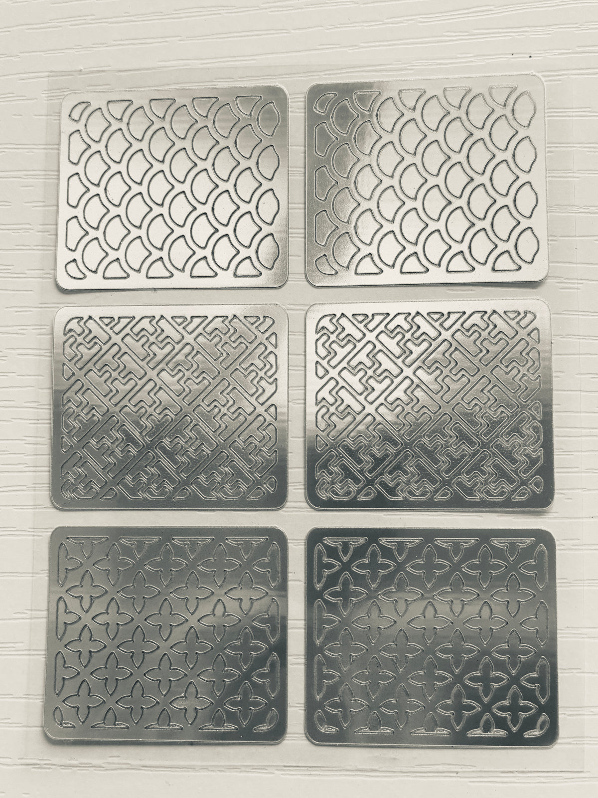 Pochoirs Nail Art – Motifs floraux & graphiques – Lot de 6
