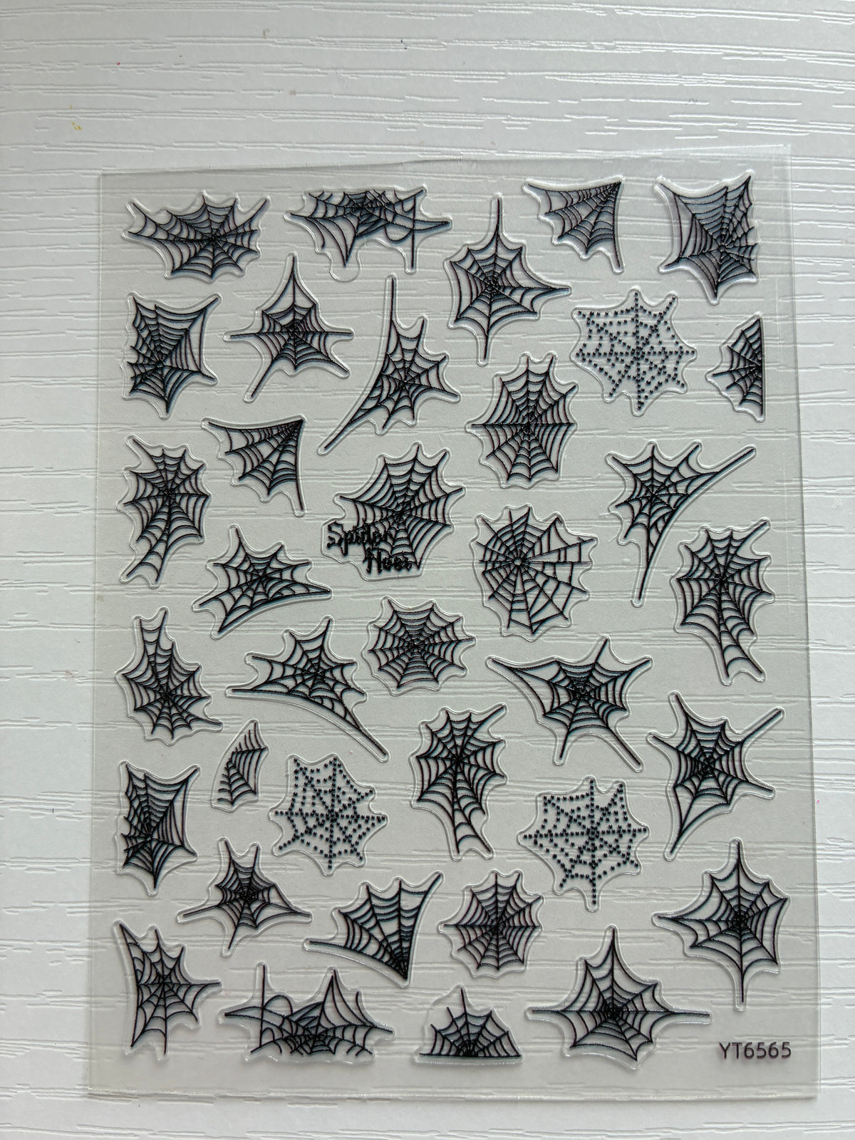 Stickers pour ongles – Toiles d’araignée noires