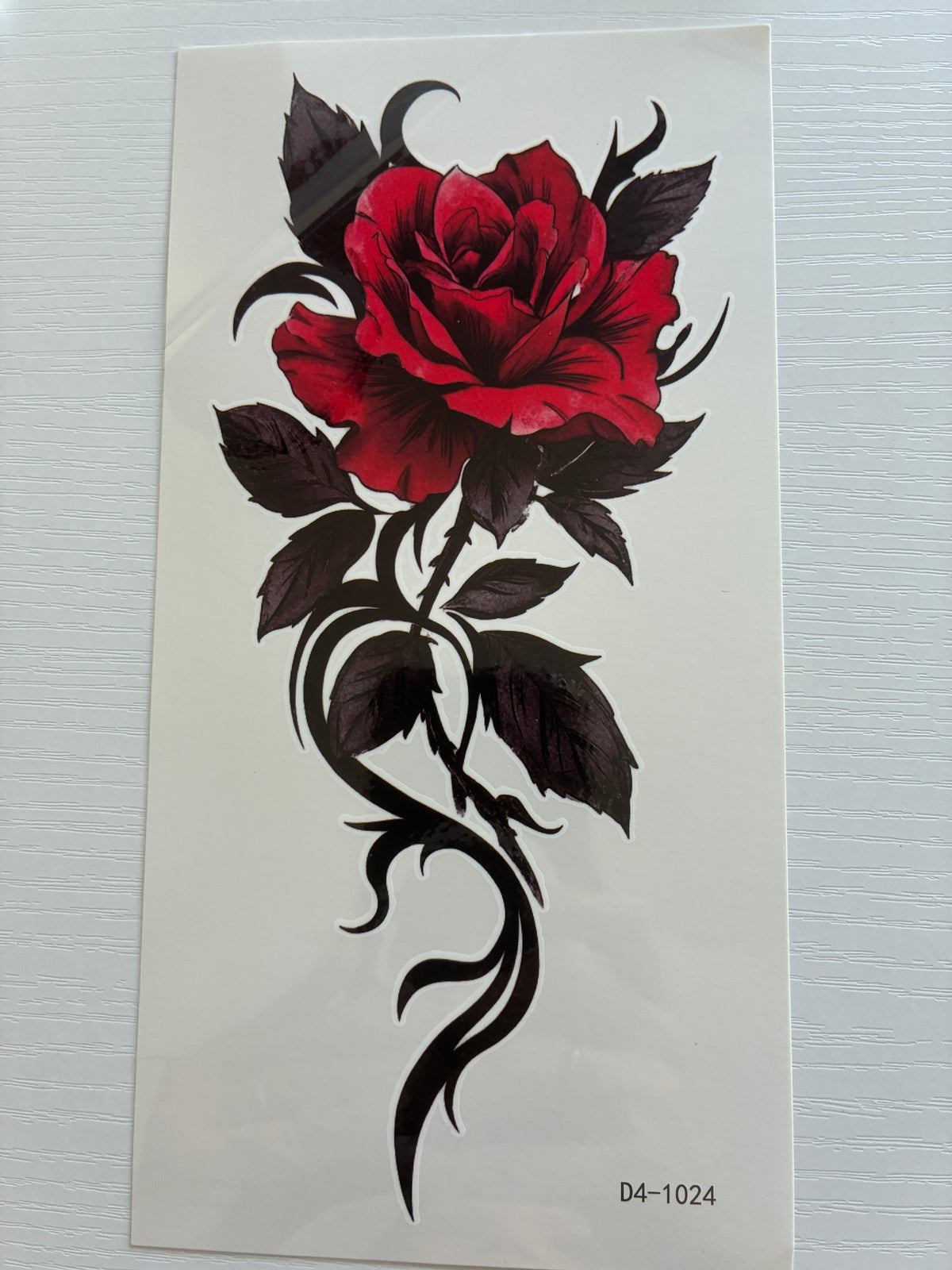 Tatouage éphémère rose rouge tribal