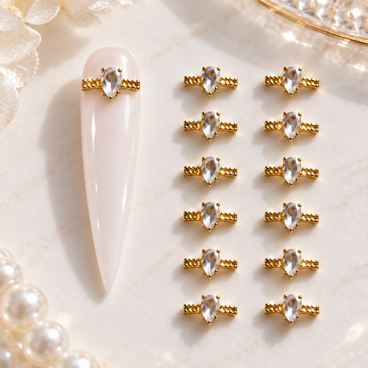 Bijoux d’ongles 3D dorés avec strass goutte – Lot de 12