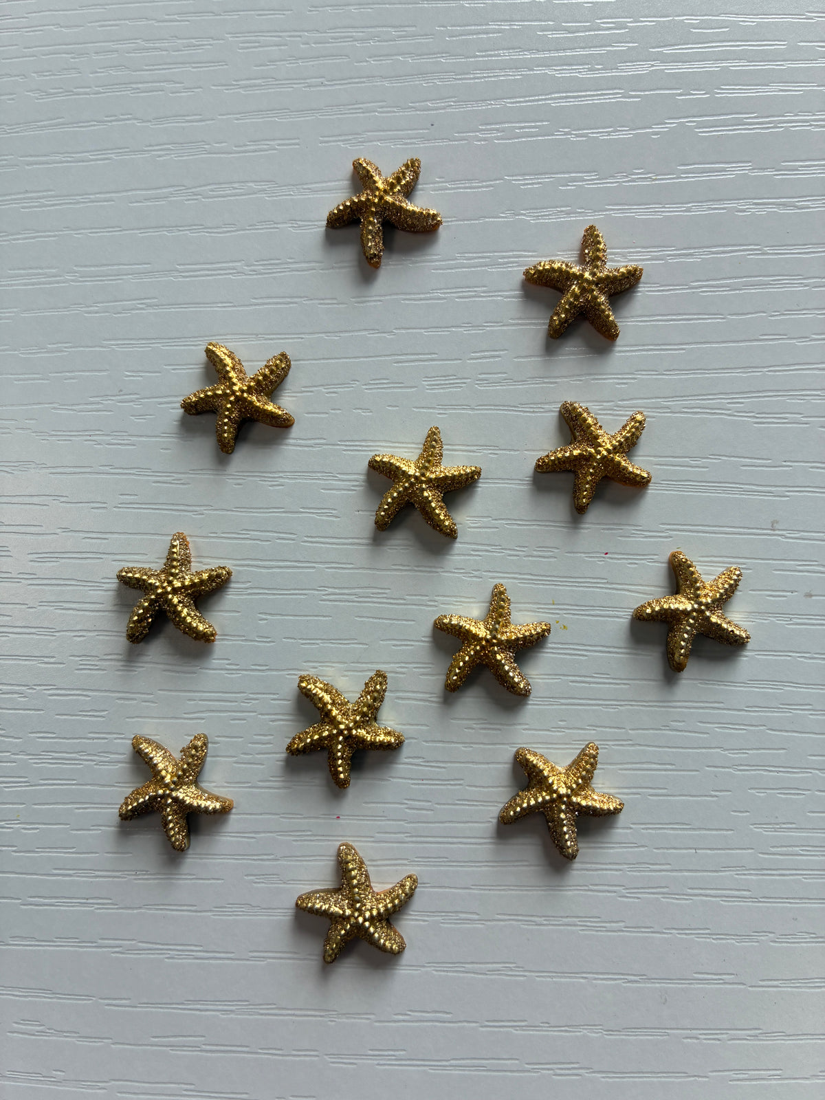 Étoiles de mer Nail Art dorées – Lot de 12