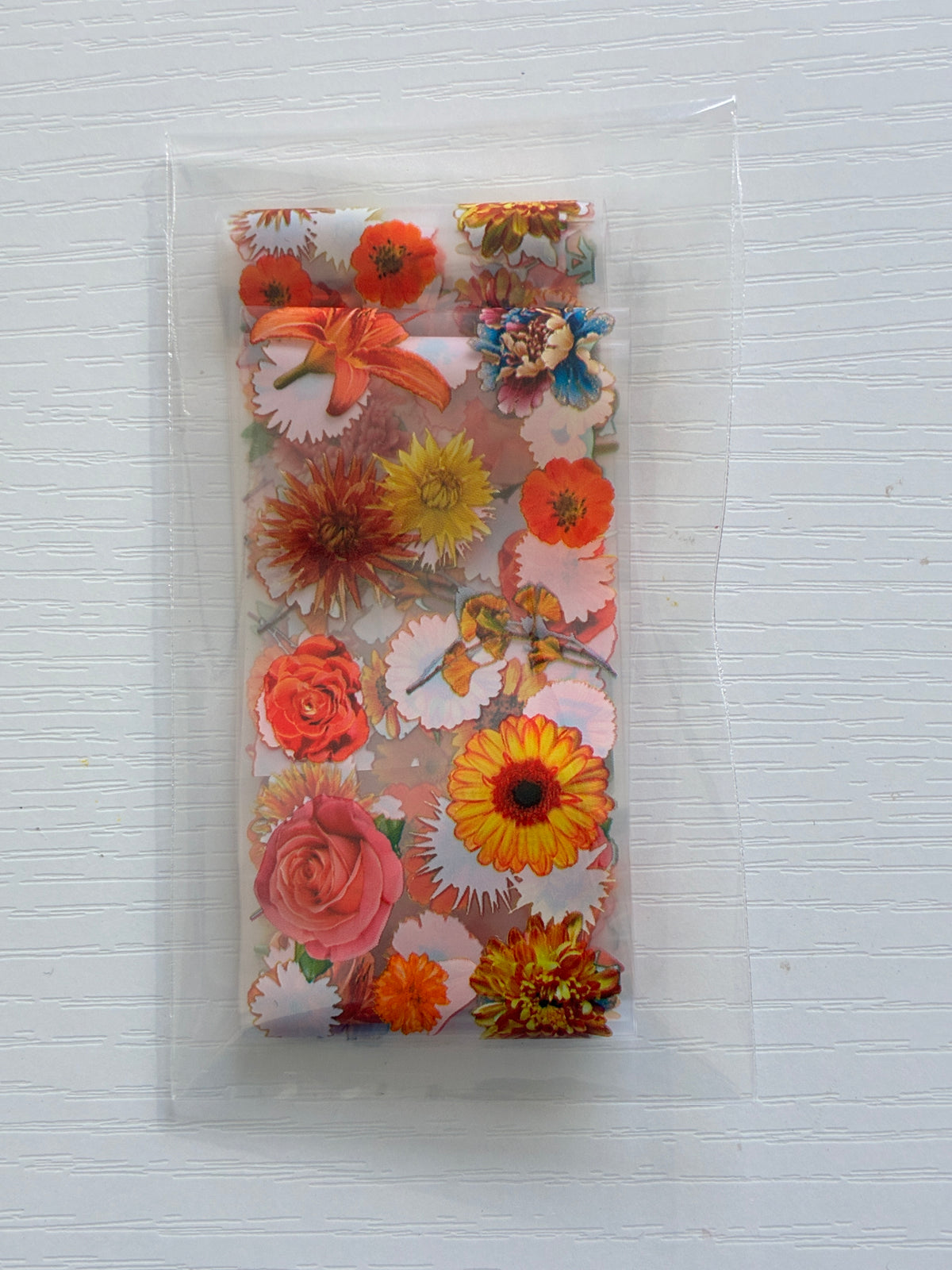Foil Nail Art – Fleurs orangées et multicolores