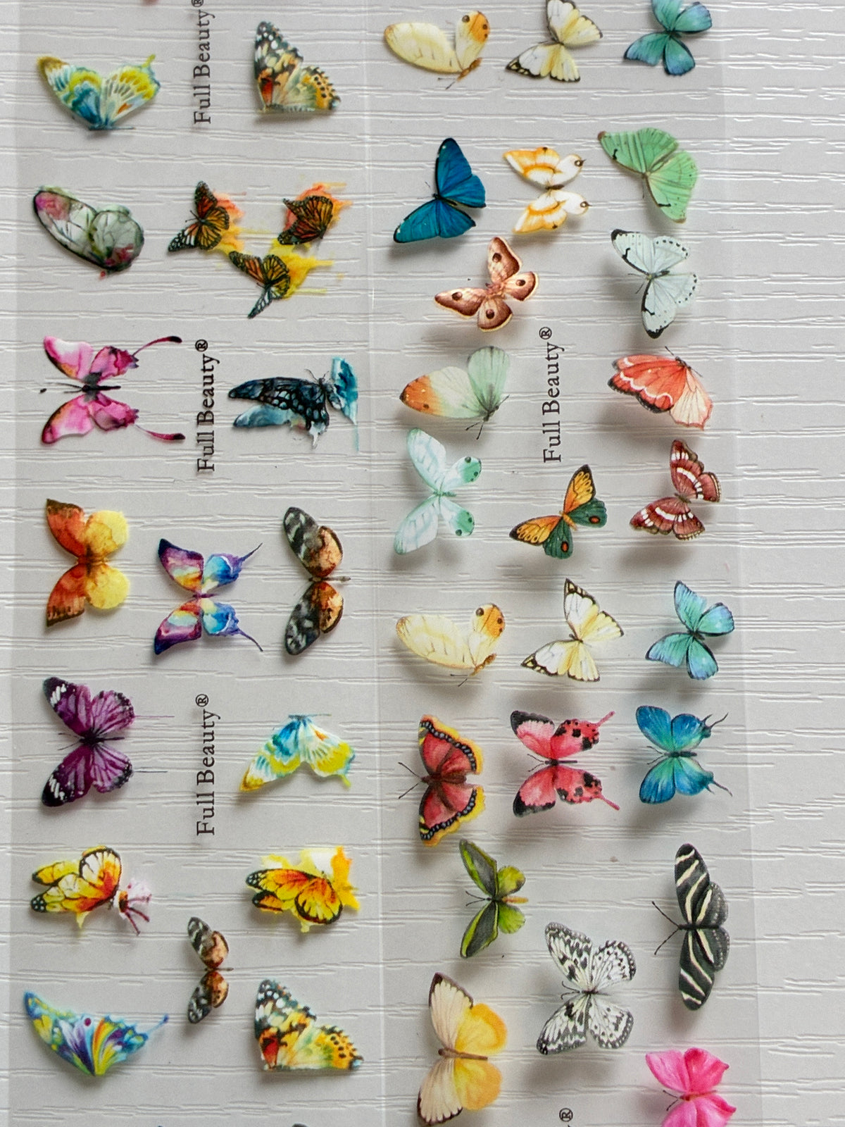 Foils Nail Art – Papillons multicolores et pastel – Lot de 2