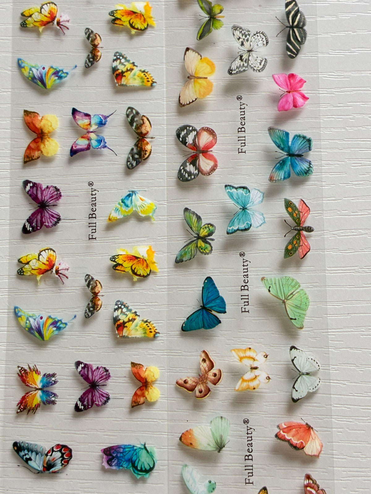 Foils Nail Art – Papillons multicolores et pastel – Lot de 2