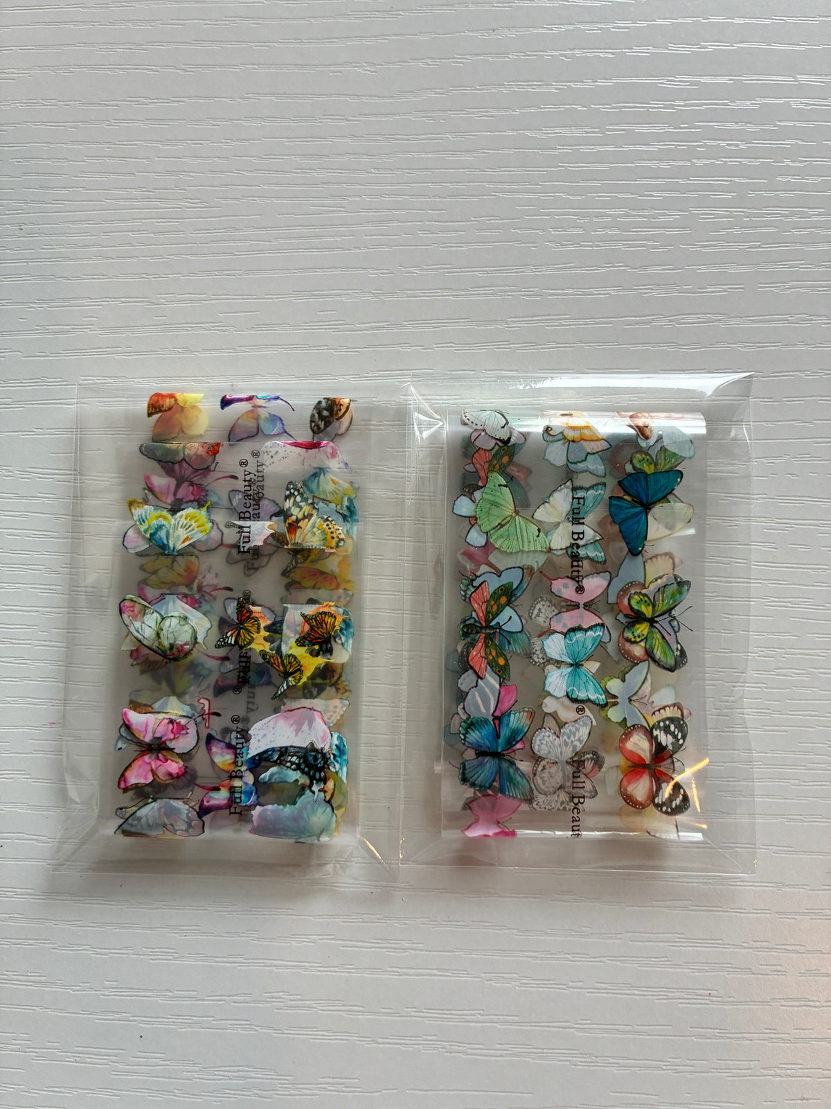 Foils Nail Art – Papillons multicolores et pastel – Lot de 2