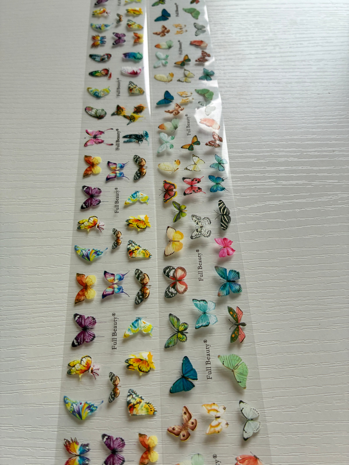 Foils Nail Art – Papillons multicolores et pastel – Lot de 2