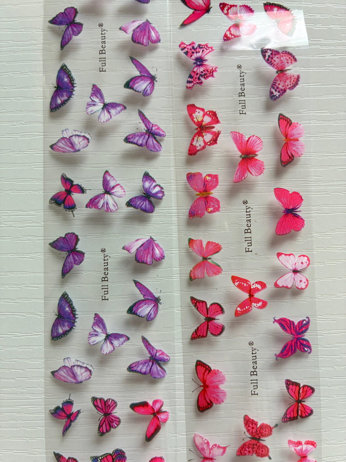 Foils Nail Art – Papillons roses et mauves – Lot de 2