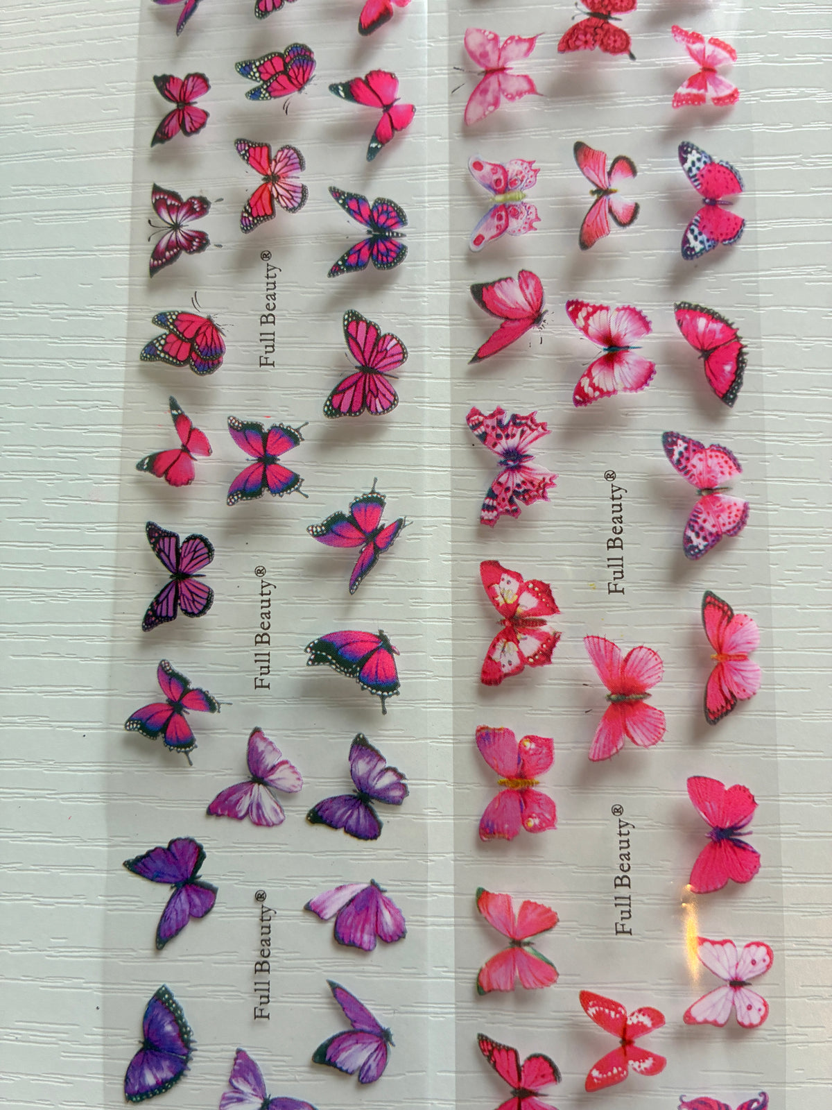 Foils Nail Art – Papillons roses et mauves – Lot de 2