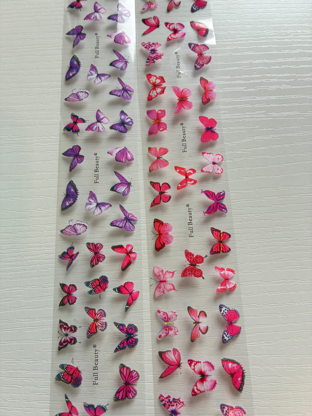 Foils Nail Art – Papillons roses et mauves – Lot de 2