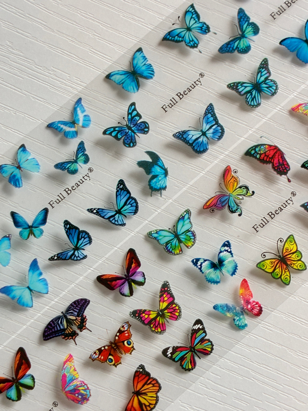 Foils Nail Art – Papillons bleus et multicolores – Lot de 2